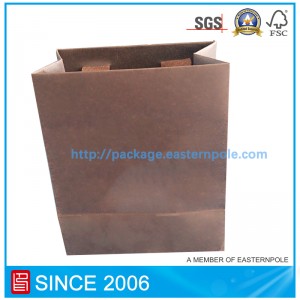 Luxury shopping bag with glued handle